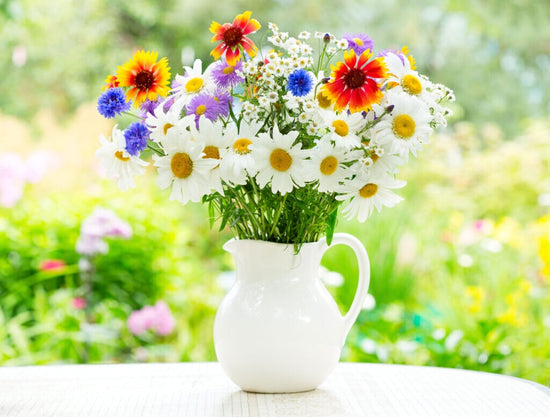 flowers in white vase