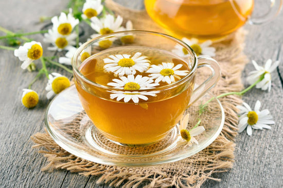 cup of herbal tea with flowers
