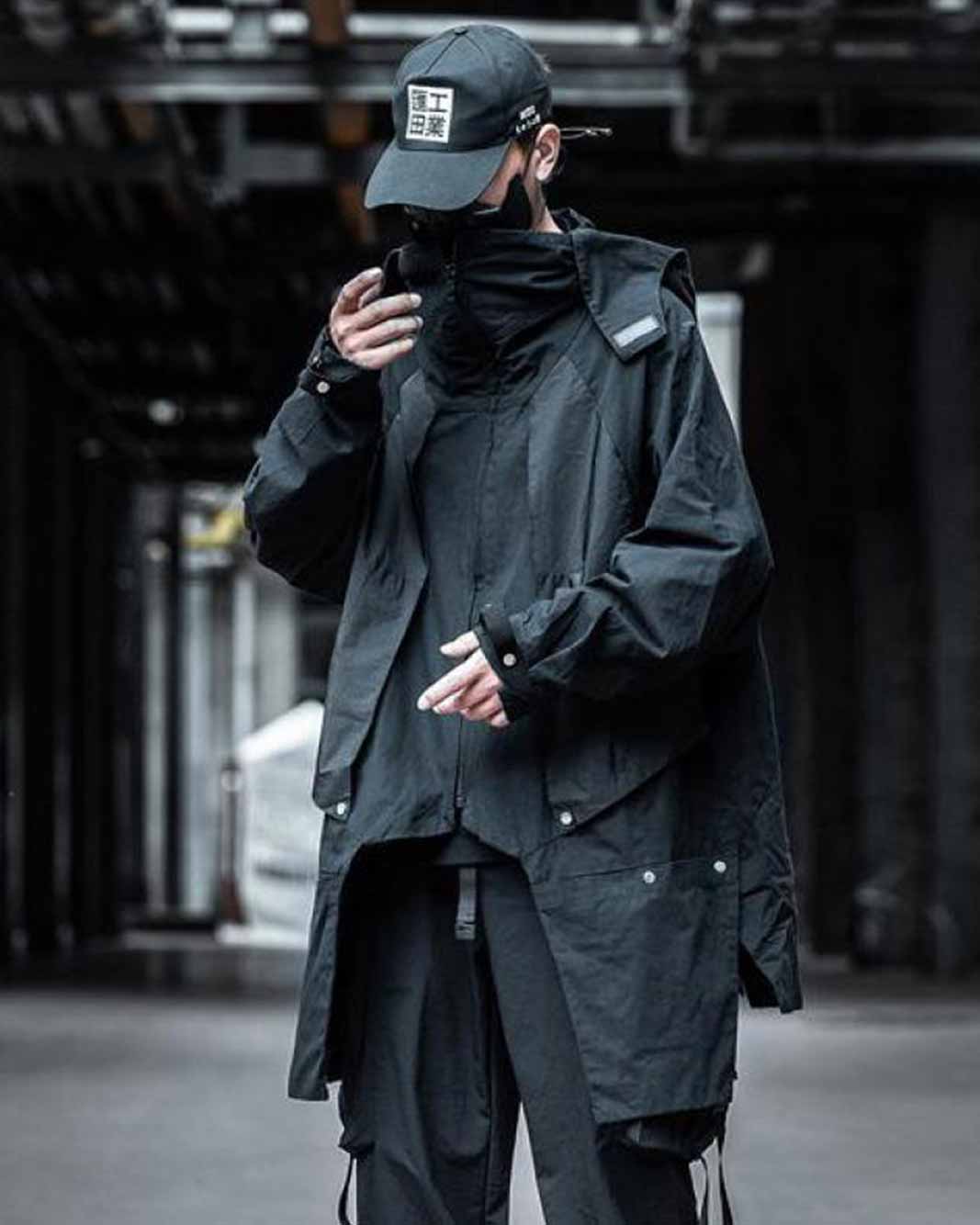 Man wearing harajuku techwear vest and a hat