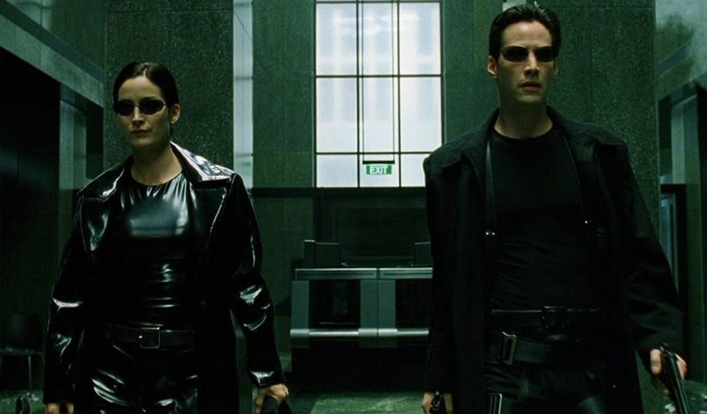 Neo and trinity with matrix fashion style, black glasses and black long coat
