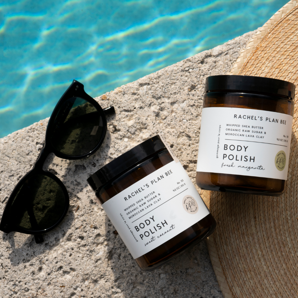 Two Body Polish jars by the pool.
