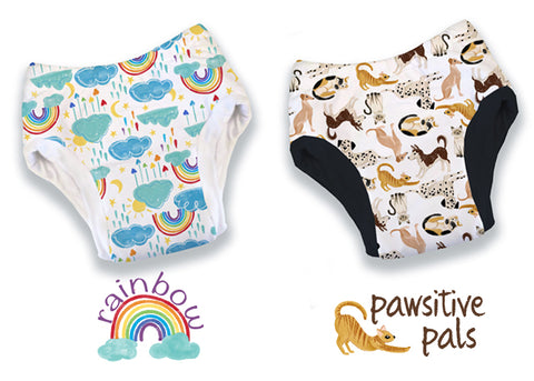 Thirsties potty training pants. Rainbow print is a white background with rainbows and blue clouds and white trim. Pawsitive Pals is a white background with black trim and various dogs and cats.