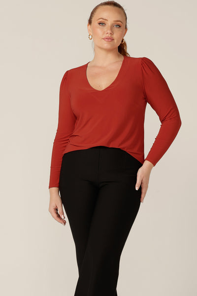 Good work tops for petite to fuller figure women, L&F's great range of women's tops includes this V-neck jersey top with long sleeves. In orange dry-touch jersey, this comfortable top is good for revitalising work wear suits and pants.