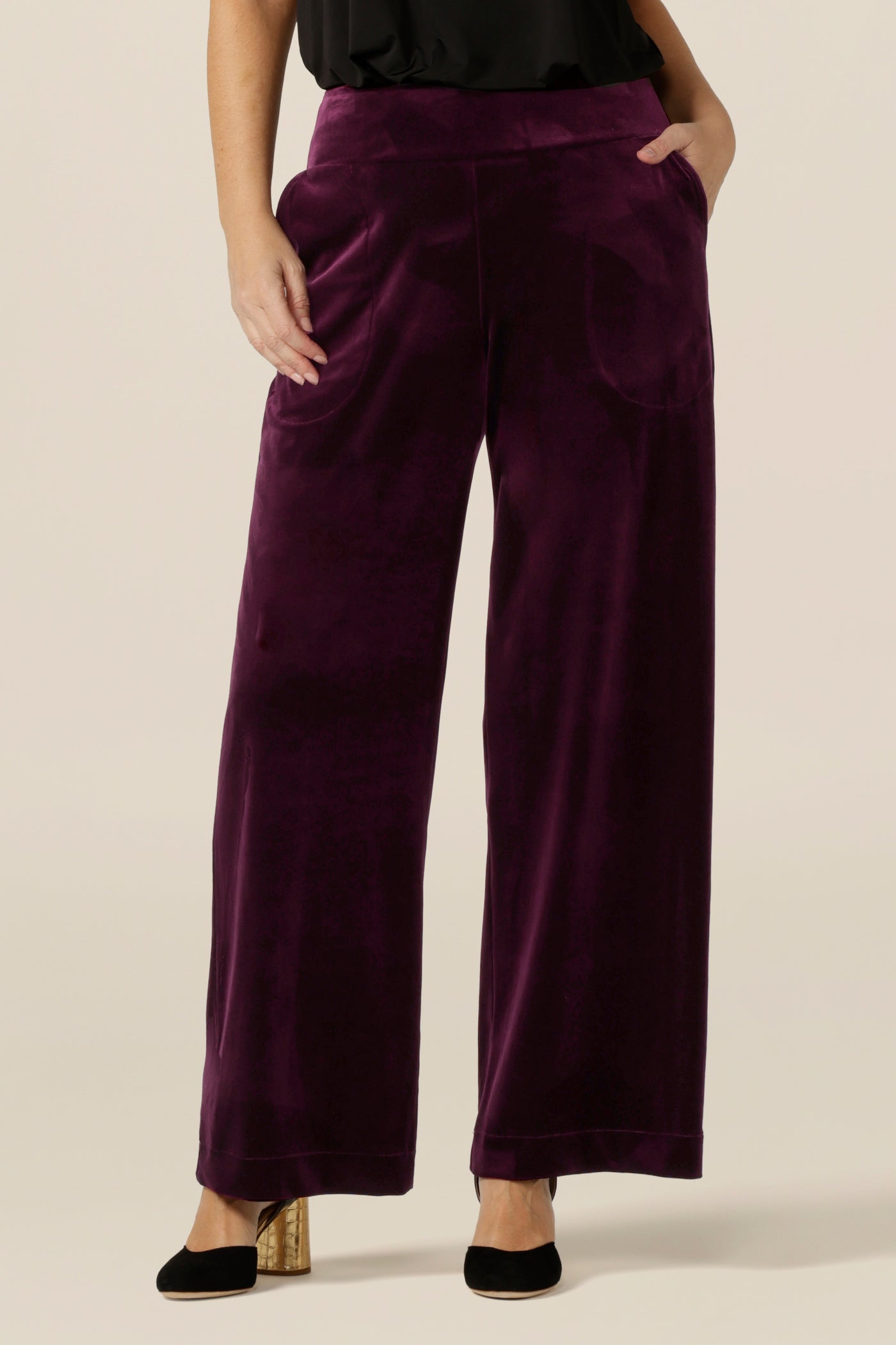 Slinky eveningwear pants make a good alternative for cocktail dress and occasionwear. Made in Australia by Australian and New Zealand women's clothing label, L&F, these straight-cut, wide leg pants in stretchy velour wear well with formal jackets or black cami tops, as shown here.