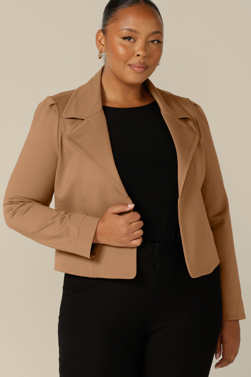 The best jacket for work or casual wear, the Garcia Jacket in Caramel is made in luxury stretch ponte fabric. Open-fronted with full length sleeves and wide collar and lapels, this classic jacket is the perfect winter layering jacket.