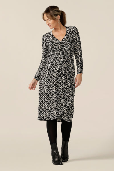 A great work dress, this is a long sleeve wrap dress with tulip skirt by Australian and New Zealand women's clothing label, L&F. Worn by a size 10, 40 plus woman, this jersey wrap dress is available in inclusive sizes, 8 to 24.