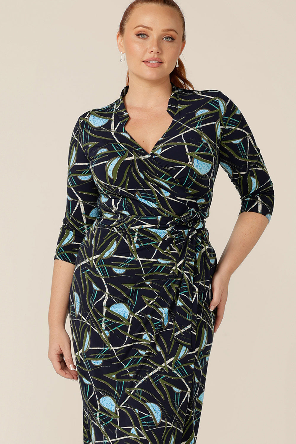 Detail shot of the wrap functioning on the Jett Wrap Dress. Made by Australia's wrap dress experts, L&F this printed jersey wrap dress is a great dress for work wear. Shop wrap dresses Australia and New Zealand-wide in sizes 8 to 24.