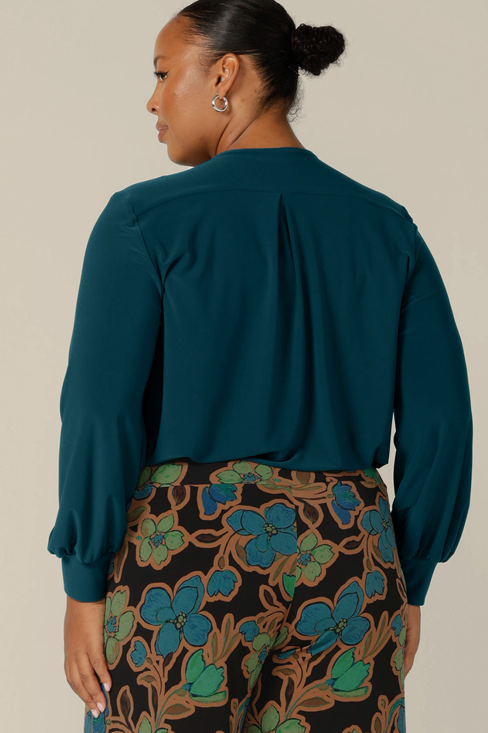 Back view of long sleeve, V-neck top in dark teal jersey, size 12 by Australian and New Zealand women's clothing company, L&F. Available to shop in sizes 8 to 24.