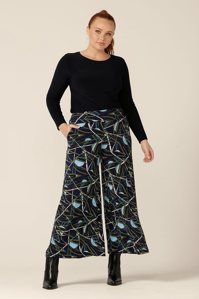 Australian-made wide-leg pants by Australian and New Zealand women's clothing label, L&F. Featuring a blue, green and white abstract print on navy-base jersey, these stretch-fit wide leg trousers wear well for workwear or casual wear.