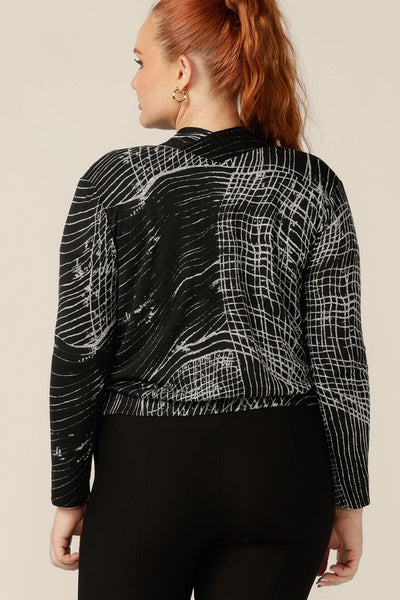 Back view of a jacket/cardigan, this textured knit 'jacardi' is a great way to layer up for winter. shown in a size 12, shop this Australian-made jacket in an inclusive size range of 8 to 24.