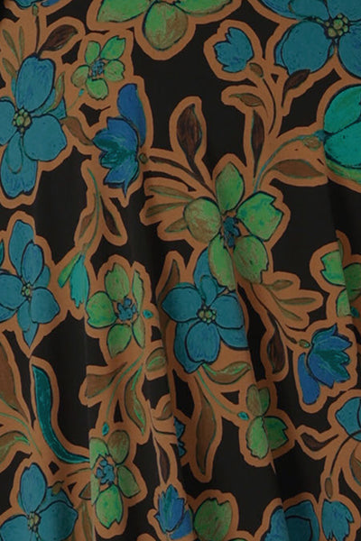 swatch of the Secret Garden floral print in shade of turquoise, blue, green and caramel on black dry touch jersey, used by L&F to make women's tops and skirts.