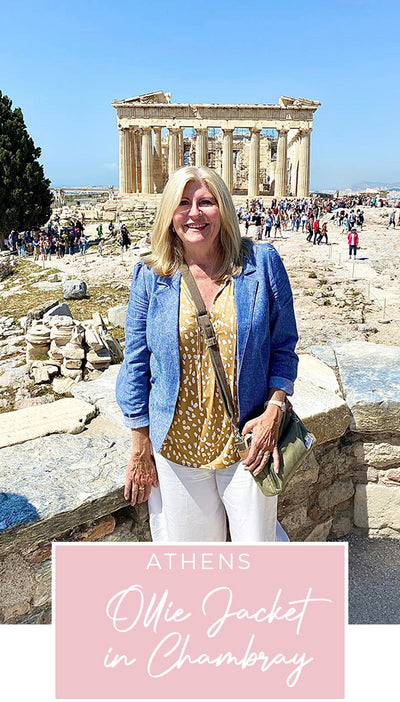 Loyal customer of Australian and New Zealand women's clothing label, elarroyoenterprises, Susan wears her chambray, denim-look blazer-style jacket in Greece, as part of her guide on what clothes to pack for your travel holiday.