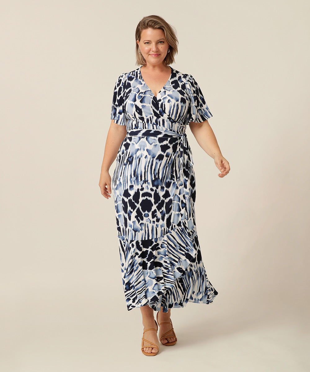 Fixed wrap maxi-length dress with frilled hemline and short fluetter sleeves. Made in Australia for petite to plus size women. 