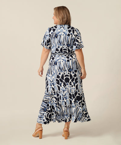 Fixed wrap maxi-length dress with frilled hemline and short fluetter sleeves. Made in Australia for petite to plus size women. 