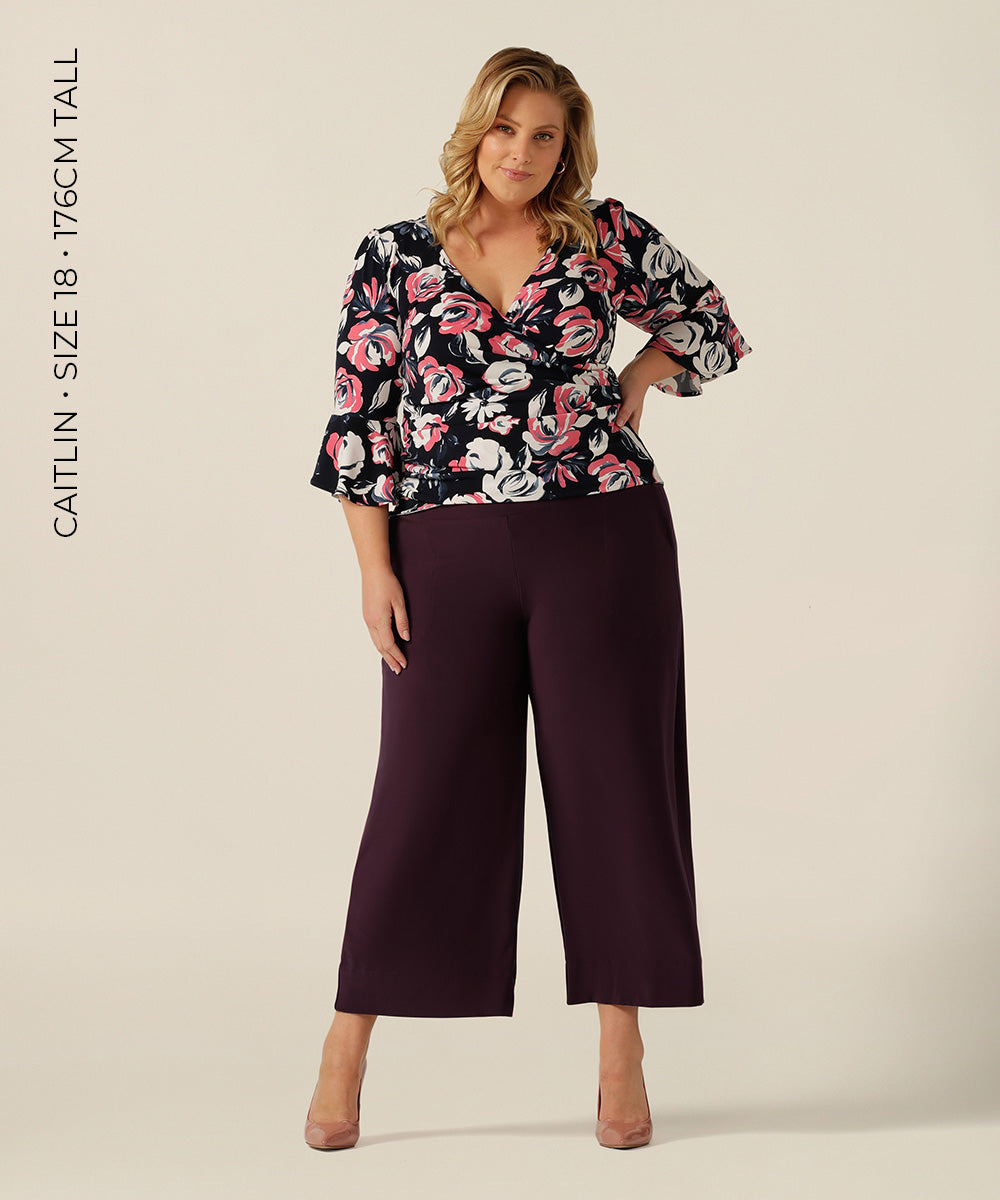 fixed wrap top with fluted sleeve detail