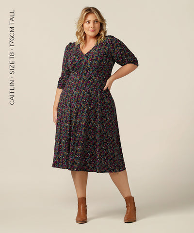 Empire-line midi length dress with 3/4 length sleeves