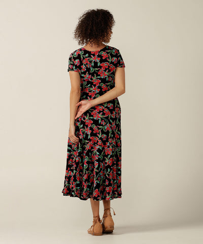 fixed wrap maxi dress with pockets and ruffle on skirt. Featuring an exclusive floral print, this dress is fitted by experts and made in Australia for plus size, petite sizes and women looking for slow fashion investment pieces.