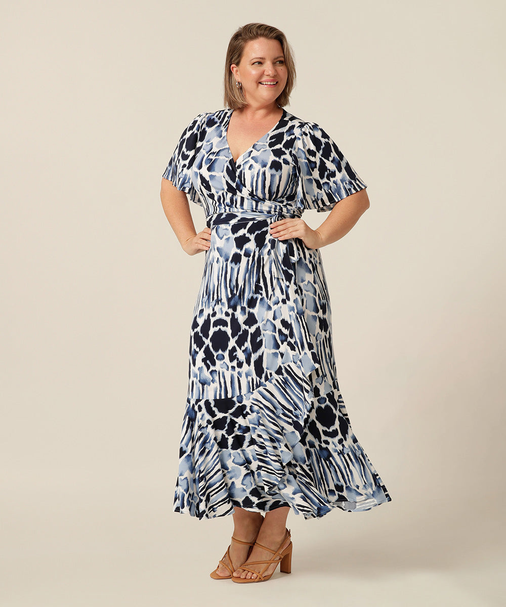 Fixed wrap maxi-length dress with frilled hemline and short fluetter sleeves. Made in Australia for petite to plus size women. 