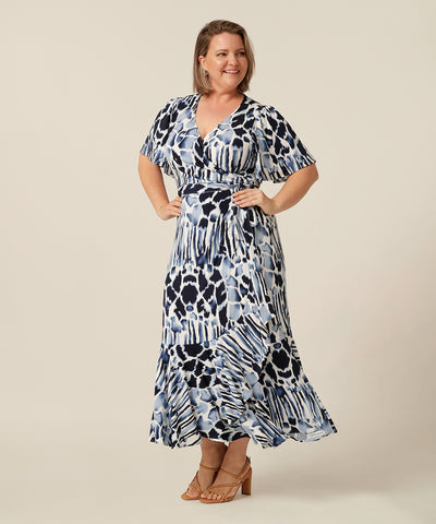 Fixed wrap maxi-length dress with frilled hemline and short fluetter sleeves. Made in Australia for petite to plus size women. 