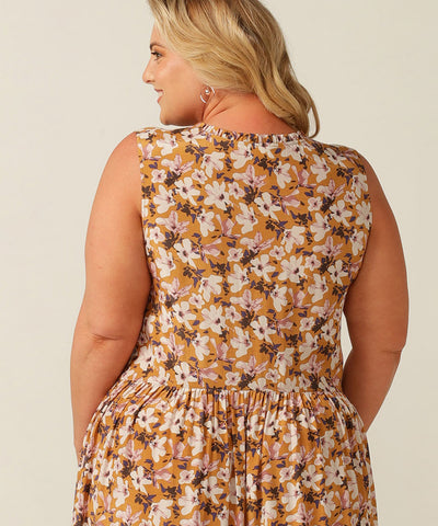 An empire line, sleeveless sun dress, the Goldie Dress in floral Siren print is lightweight and breathable in Viscose. Made in Australia for petite to plus size women. 