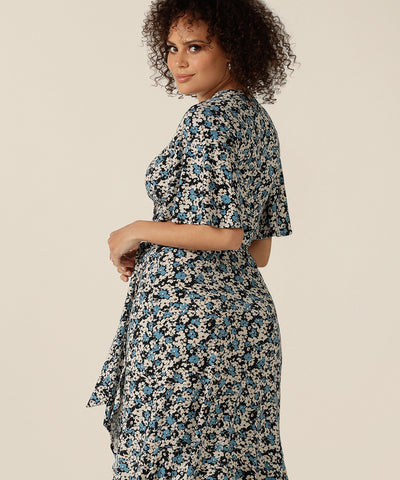 wrap dress with flutter sleeves and skirt ruffle