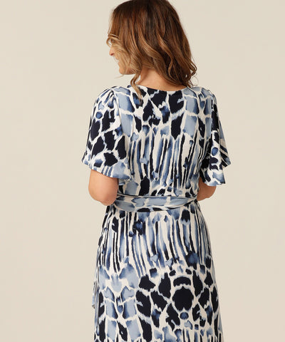 Fixed wrap maxi-length dress with frilled hemline and short fluetter sleeves. Made in Australia for petite to plus size women. 