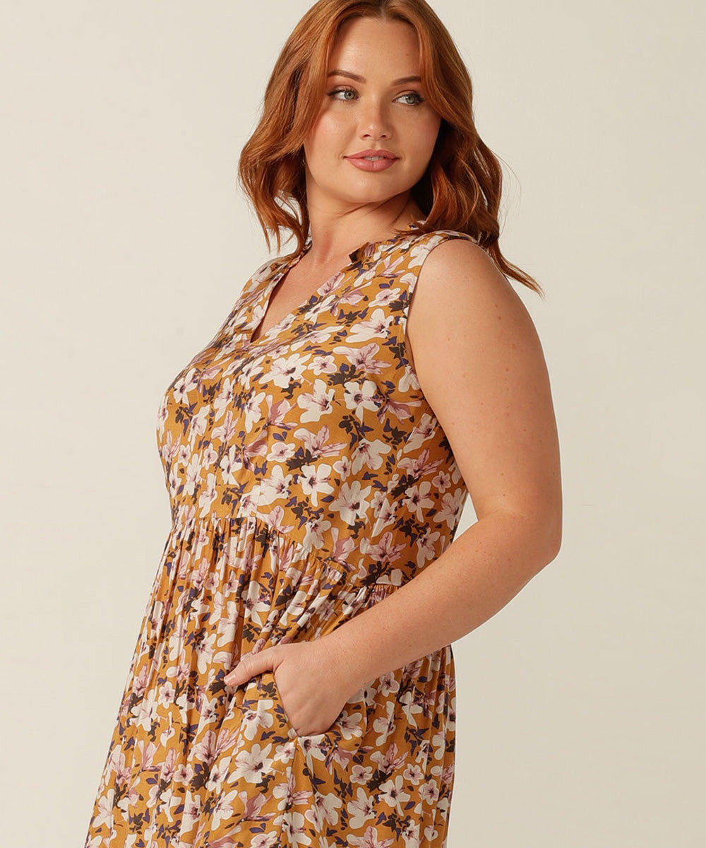 An empire line, sleeveless sun dress, the Goldie Dress in floral Siren print is lightweight and breathable in Viscose. Made in Australia for petite to plus size women. 