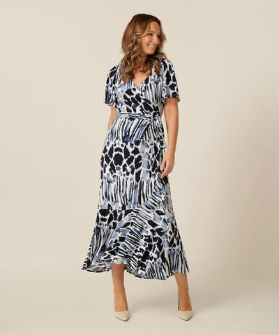 Fixed wrap maxi-length dress with frilled hemline and short fluetter sleeves. Made in Australia for petite to plus size women. 