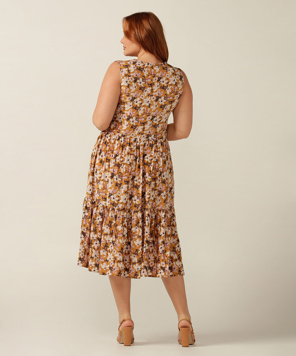 An empire line, sleeveless sun dress, the Goldie Dress in floral Siren print is lightweight and breathable in Viscose. Made in Australia for petite to plus size women. 