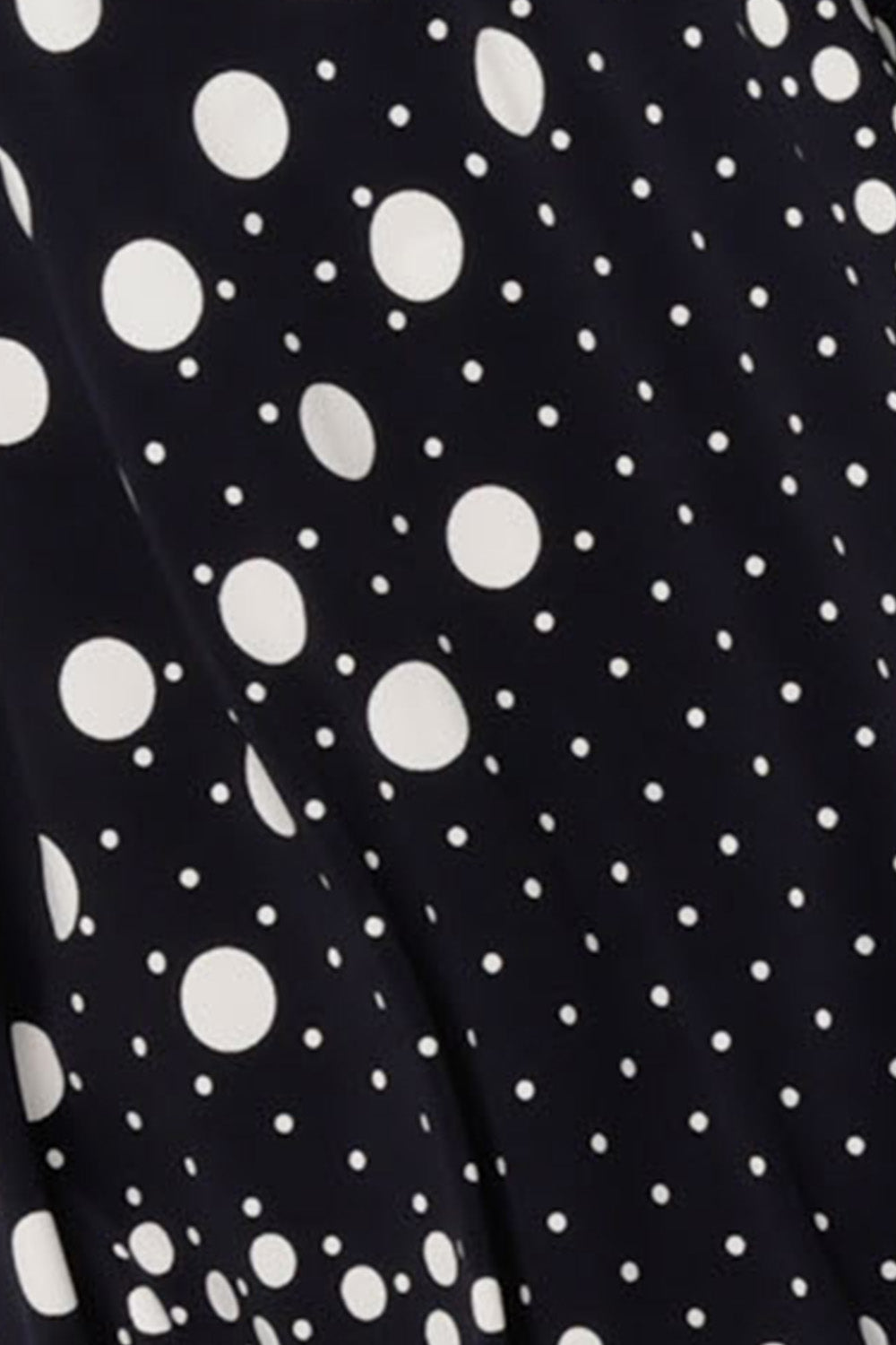 Fabric swatch of Australia and New Zealand women's clothing label, L&F's navy and white polka dot 'Foxtrot' print used on a range of wrap dresses and workwear tops.