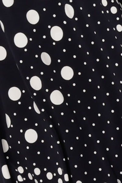 fabric swatch of a navy and white polka dot print jersey fabric used by Australian and New Zealand womenswear brand, L&F to make a range of women's work tops and dresses.