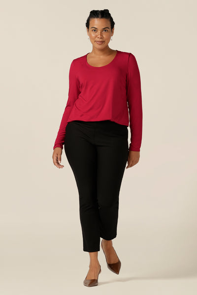 In super-soft bamboo jersey, this round neck, long sleeve jersey top is the most comfortable top to transition the seasons in. Not only is the bamboo jersey a natural, breathable fabric, this top's red colour adds warmth for autumn/winter 23 fashion. Worn with cropped tailored black pants, this top has a smart-casual look.