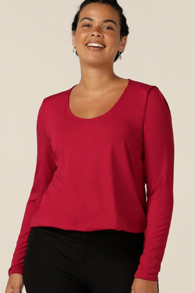 In super-soft bamboo jersey, this round neck, long sleeve jersey top is the most comfortable top to transition the seasons in. Not only is the bamboo jersey a natural, breathable fabric, this top's red colour adds warmth for autumn/winter 23 fashion.  Wear for casual or with tailored suiting for workwear.