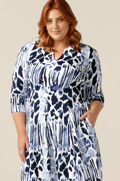 Women of Australia and New Zealand, this Nova Dress is tailored in stretch jersey for a comfortable work wear dress that's easy to wear all day. With 3/4 sleeves, side pockets and V-neck, this dress is a modest business dress for sizes 8 to size 24. This dress is made in Australia.