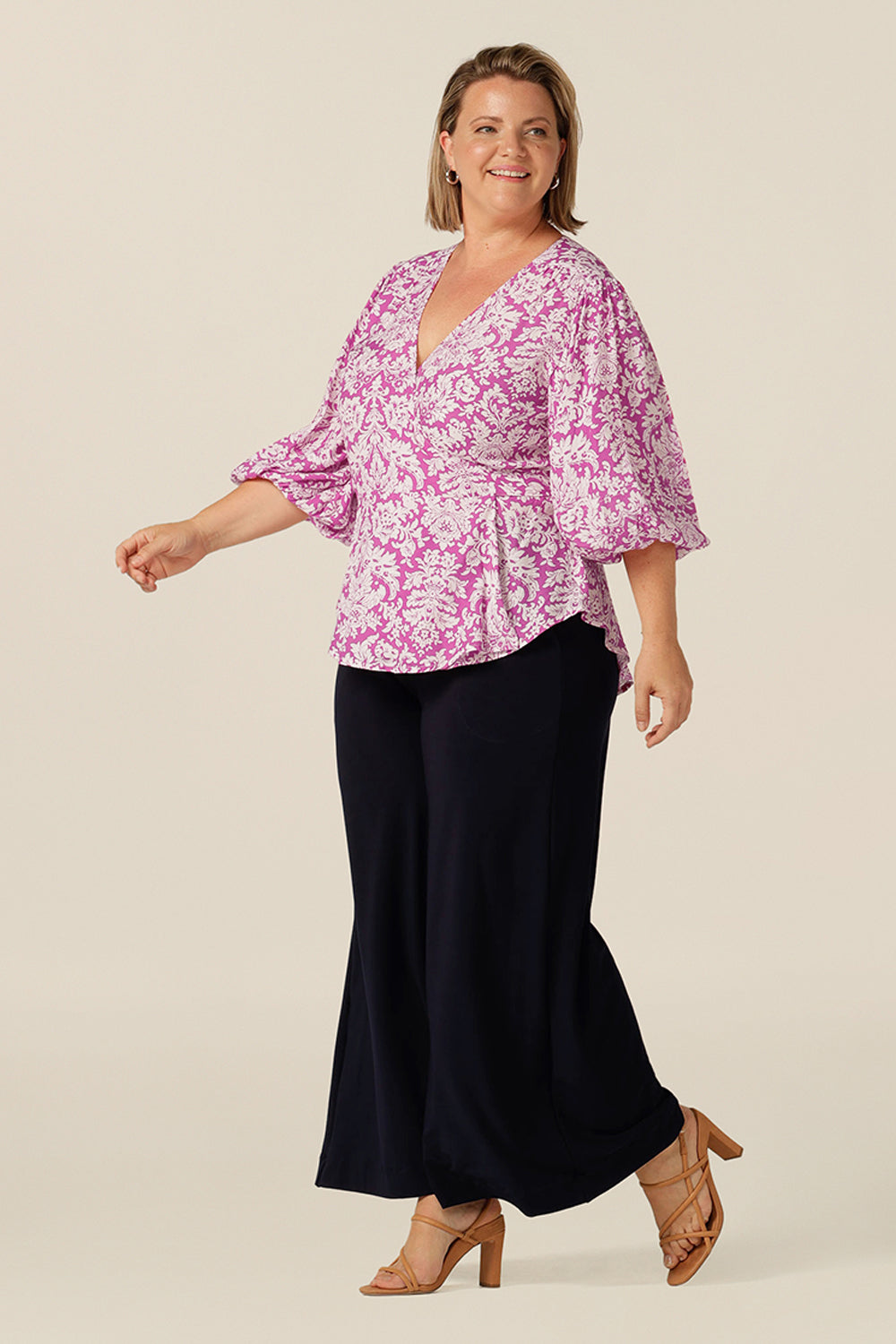 wrap top with 3/4 puff sleeves, made in Australia in eco-conscious fabric for petite to plus size women.