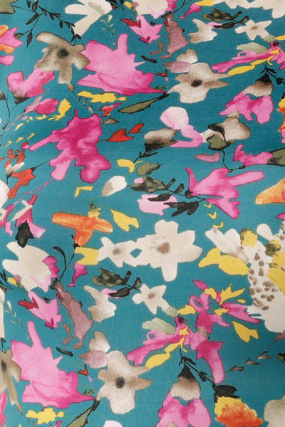 swatch of floral print on a slinky jersey base used by Australian-made women's clothing brand, Leina and Fleur in a range of corporate tops and dresses for back-to-work style. 