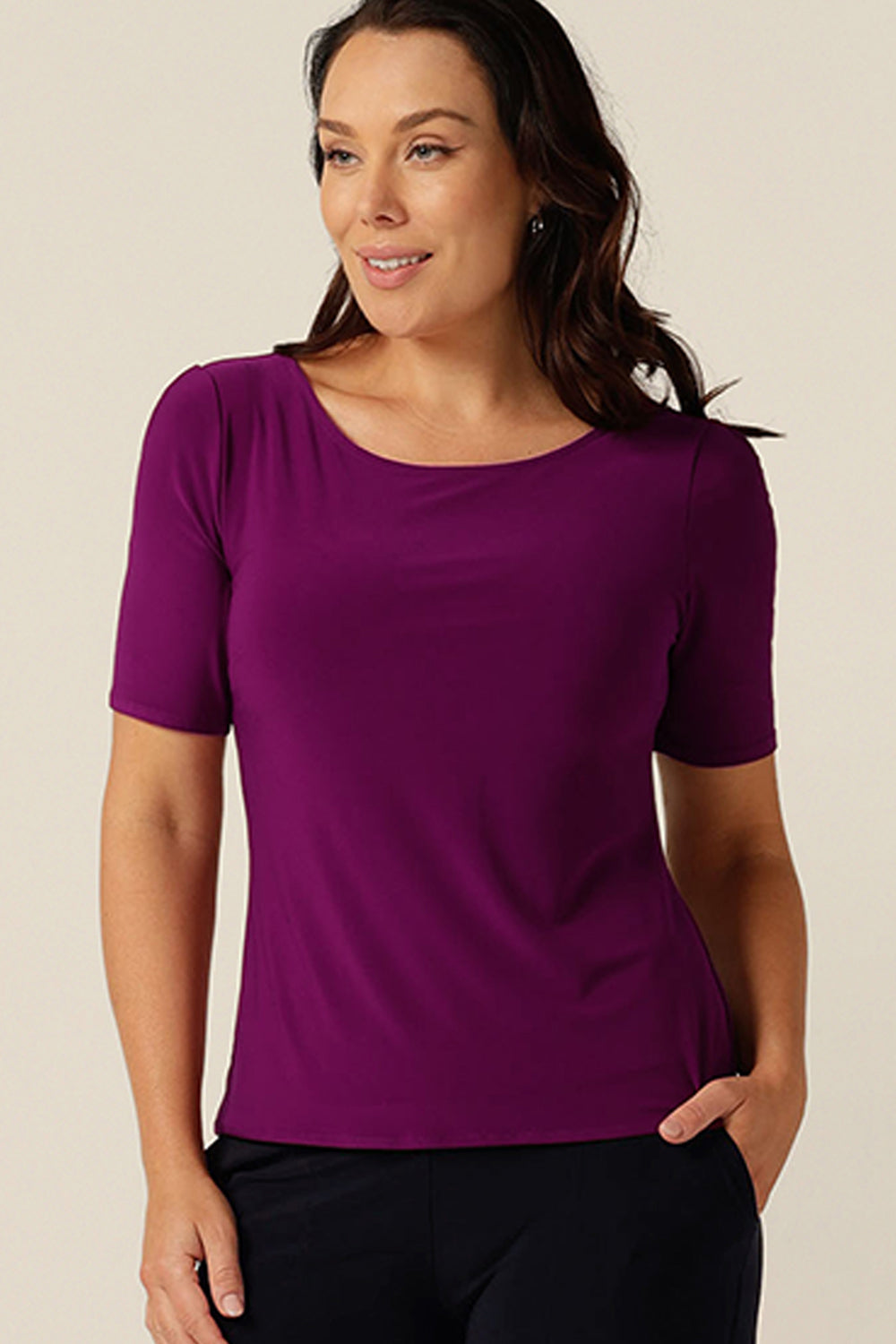 simple line, softly tailored magenta jersey top with boat neckline and short sleeves