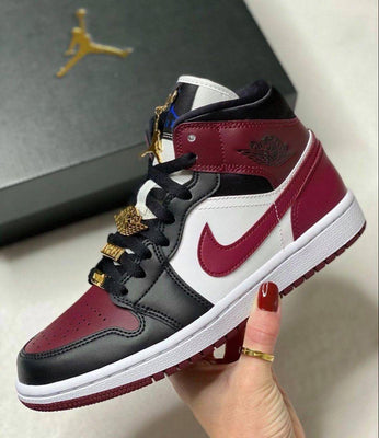 jordan 1 maroon black gold