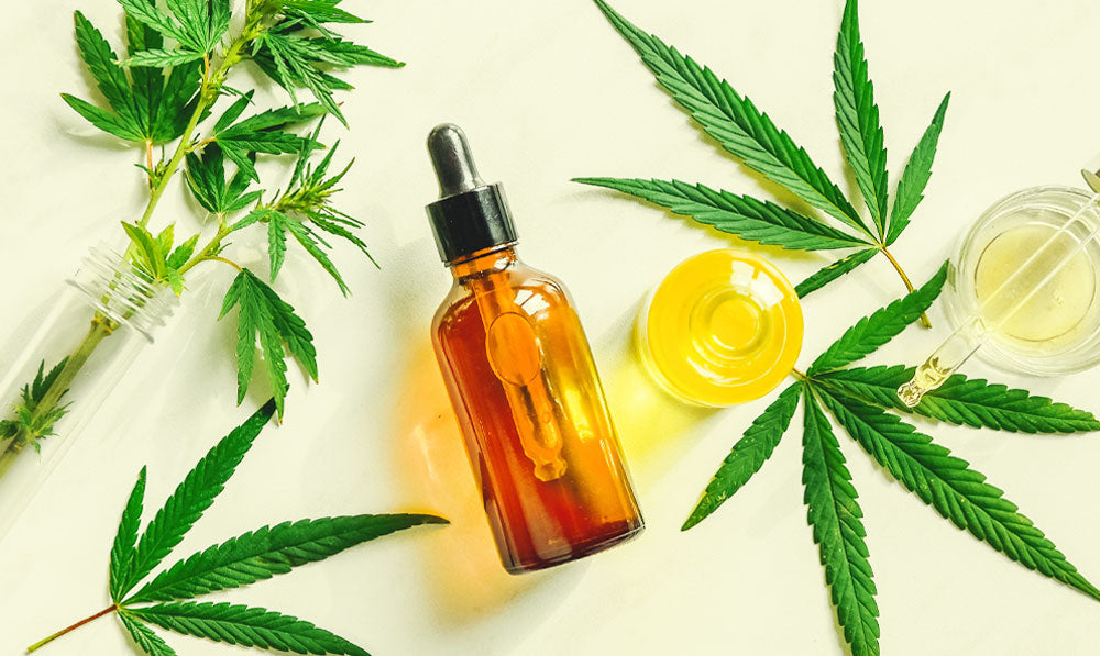 CBD products resting on light surface