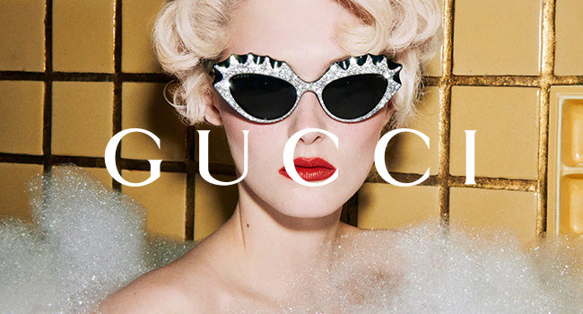Female model wearing Gucci sunglasses