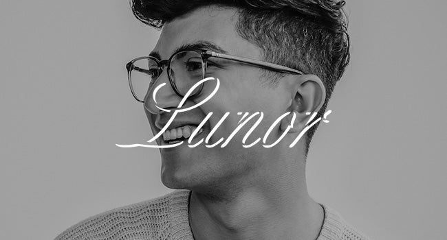 Male model wearing Lunor eyeglasses