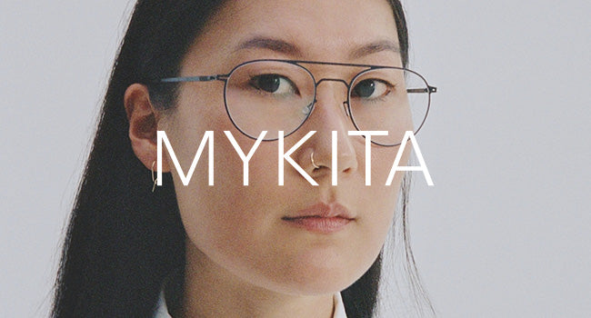 Female model wearing Mykita eyeglasses