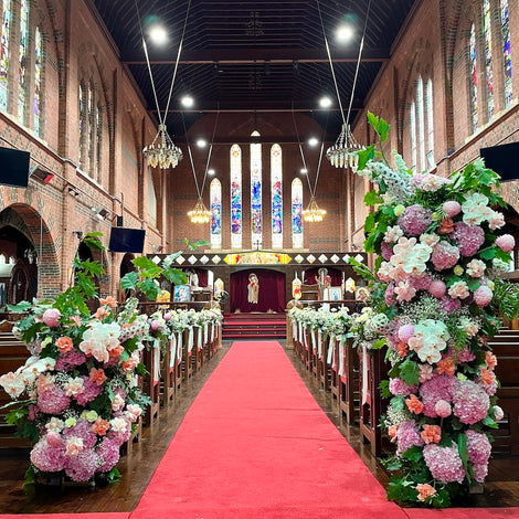 Wedding ceremony flower towers