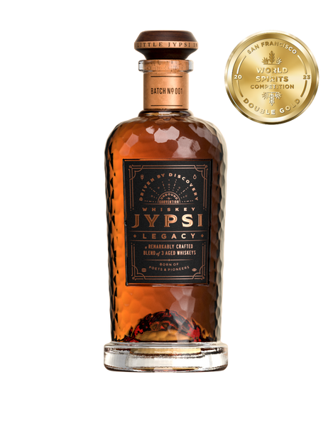 Bottle of Whiskey JYPSI with their award from the World Spirits Competition