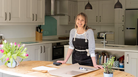 Louise at her kitchen table ready to print