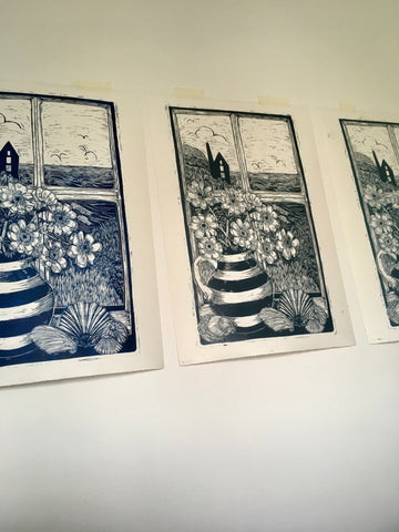 "Beautiful Cornwall" Lino-prints, taped to the wall in blue, black and grey
