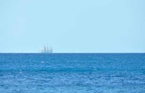 Tall ship on the horizon