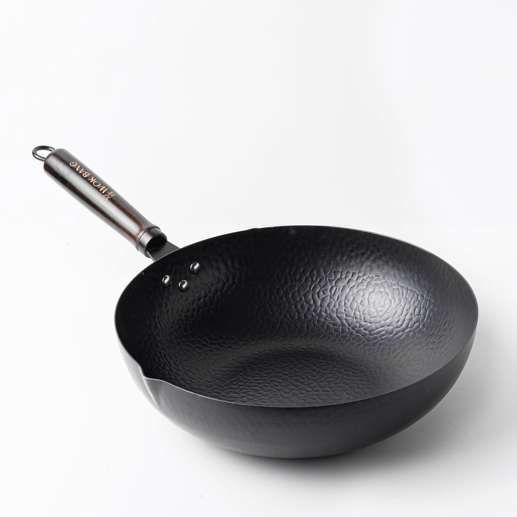 The Wok Store - VEGAN Pre-Seasoned Wok now available - Flat Bottom Long  Handle, Hand Made and Hand Seasoned size 36cm. We can now offer our  signature long handle wok as a