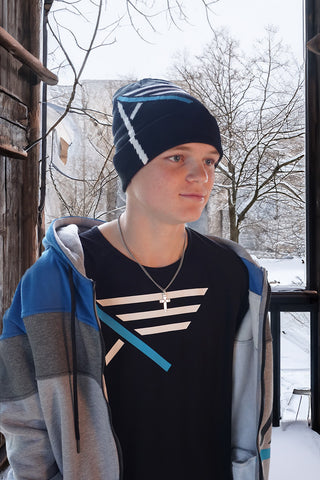 Christian teen wearing a cross with zip-up hoodie, beanie, and bamboo tee.