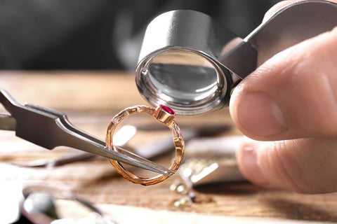 jewelry appraiser looking at jewelry